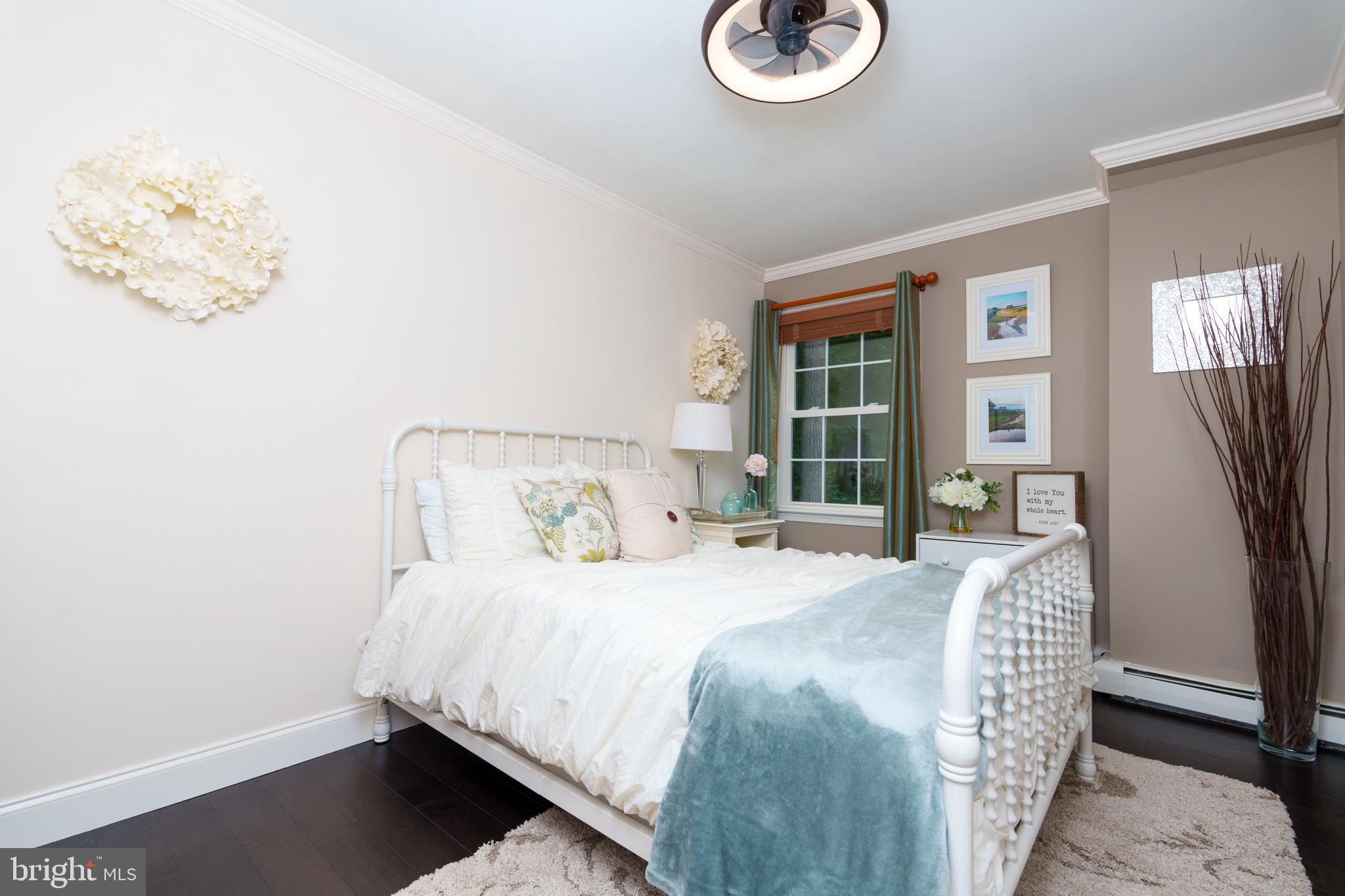 1411 Greenhill Road West Chester, PA 19380 - Photo 24 of 40 a bedroom with a bed and a window