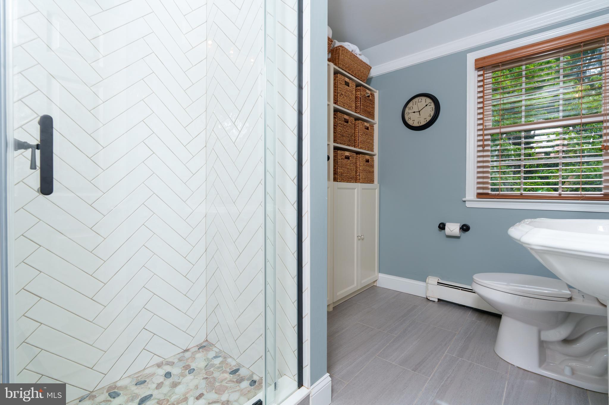 1411 Greenhill Road West Chester, PA 19380 - Photo 27 of 40 a bathroom with a toilet and a shower