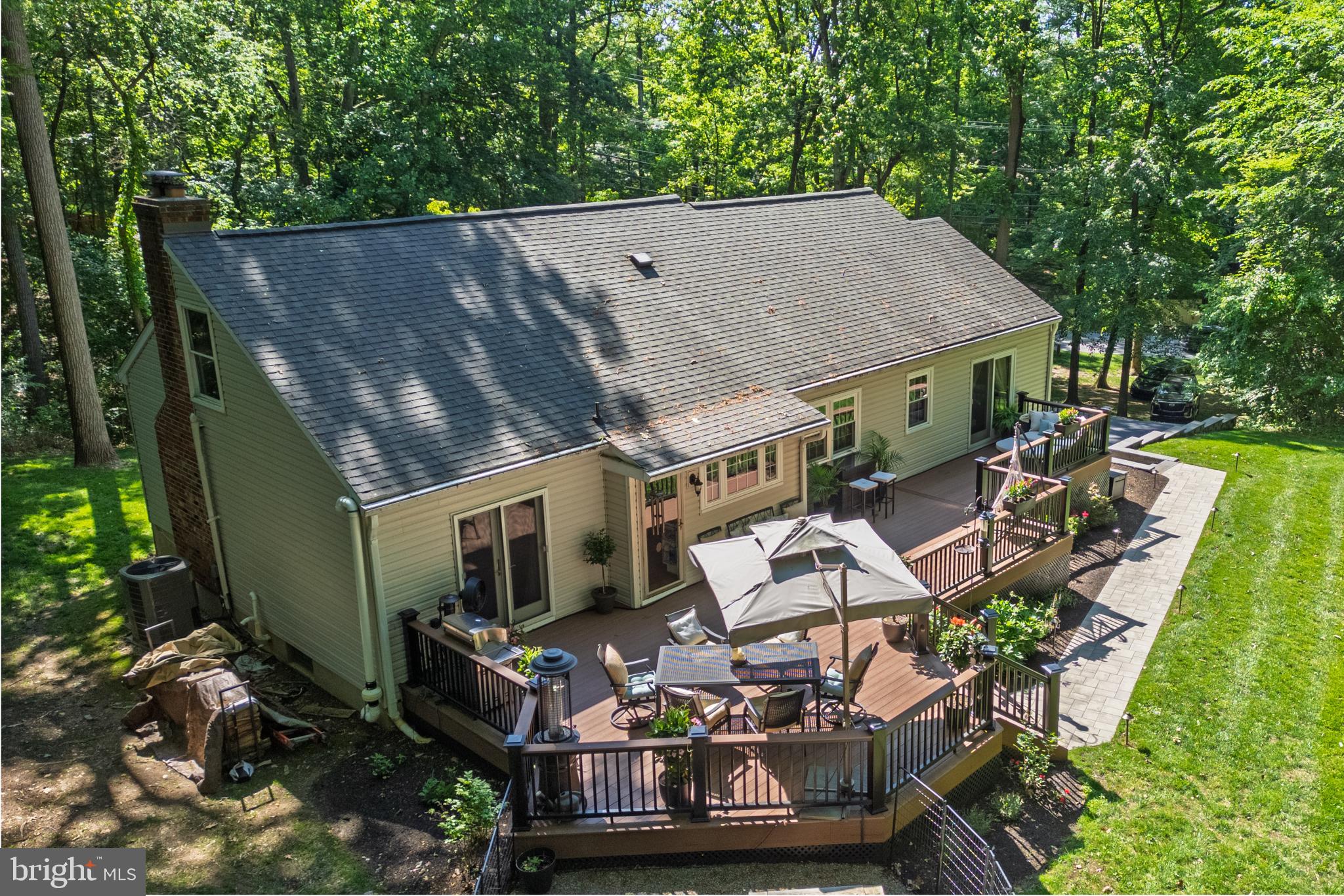 1411 Greenhill Road West Chester, PA 19380 - Photo 4 of 40 an aerial view of a house with outdoor space