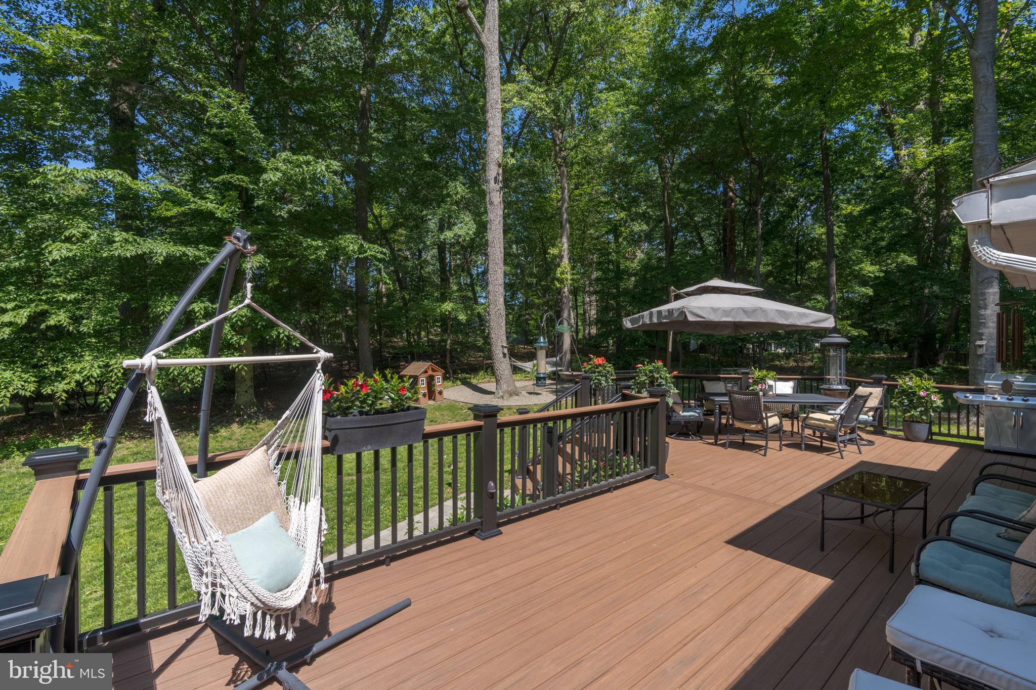 1411 Greenhill Road West Chester, PA 19380 - Photo 6 of 40 a view of a deck with furniture and barbeque grill
