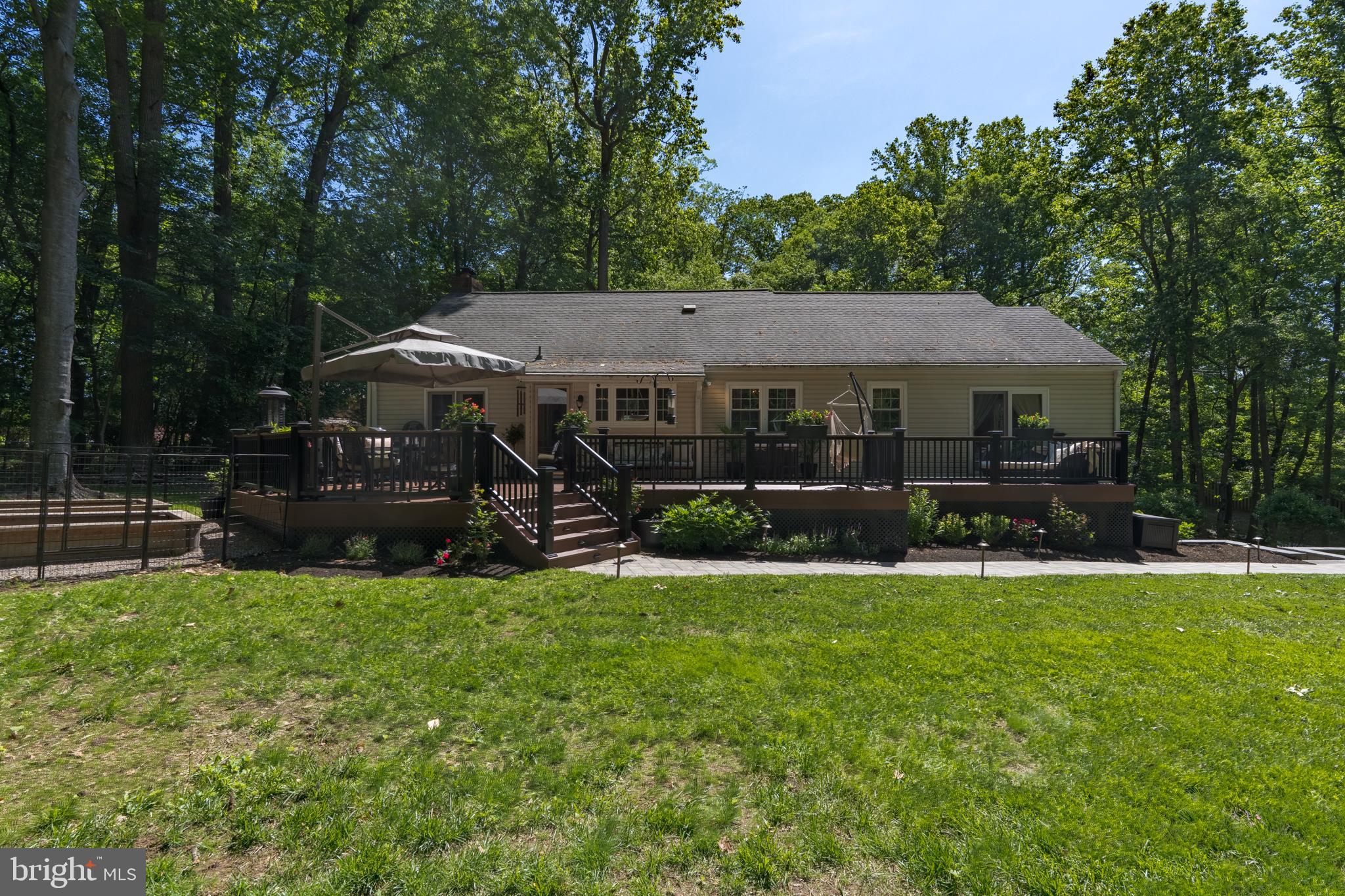 1411 Greenhill Road West Chester, PA 19380 - Photo 8 of 40 a view of a house with a yard porch and sitting area