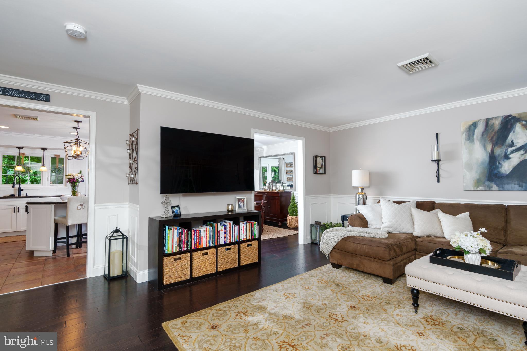 1411 Greenhill Road West Chester, PA 19380 - Photo 9 of 40 a living room with furniture and a flat screen tv