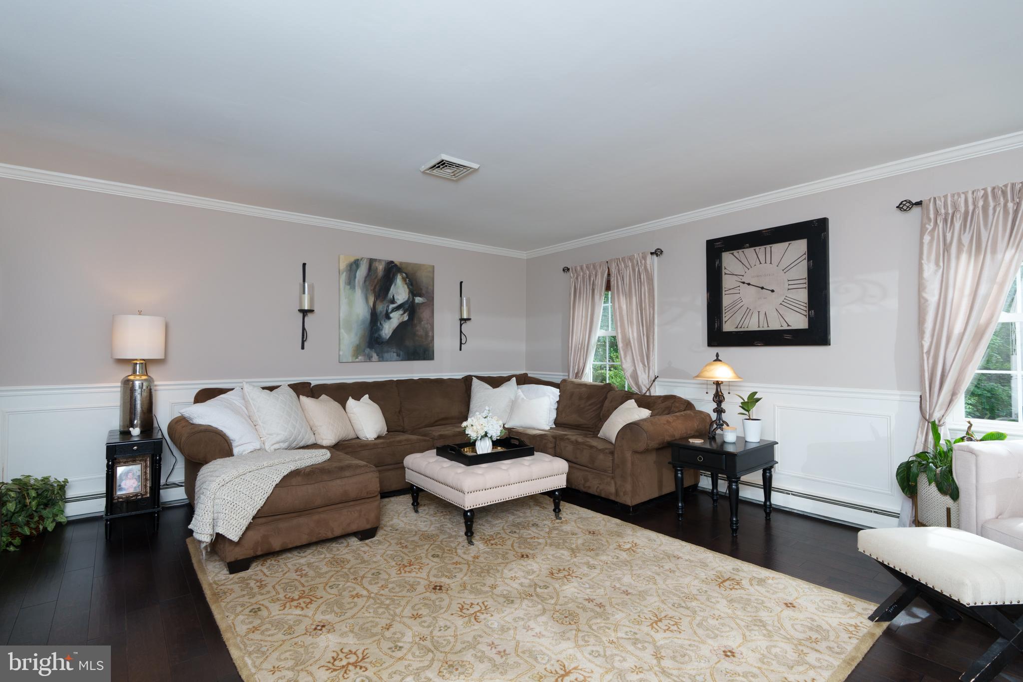 1411 Greenhill Road West Chester, PA 19380 - Photo 10 of 40 a living room with furniture and wooden floor