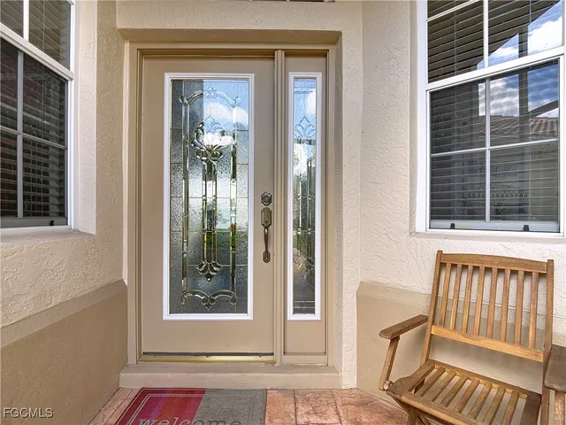 a view of a door and a window