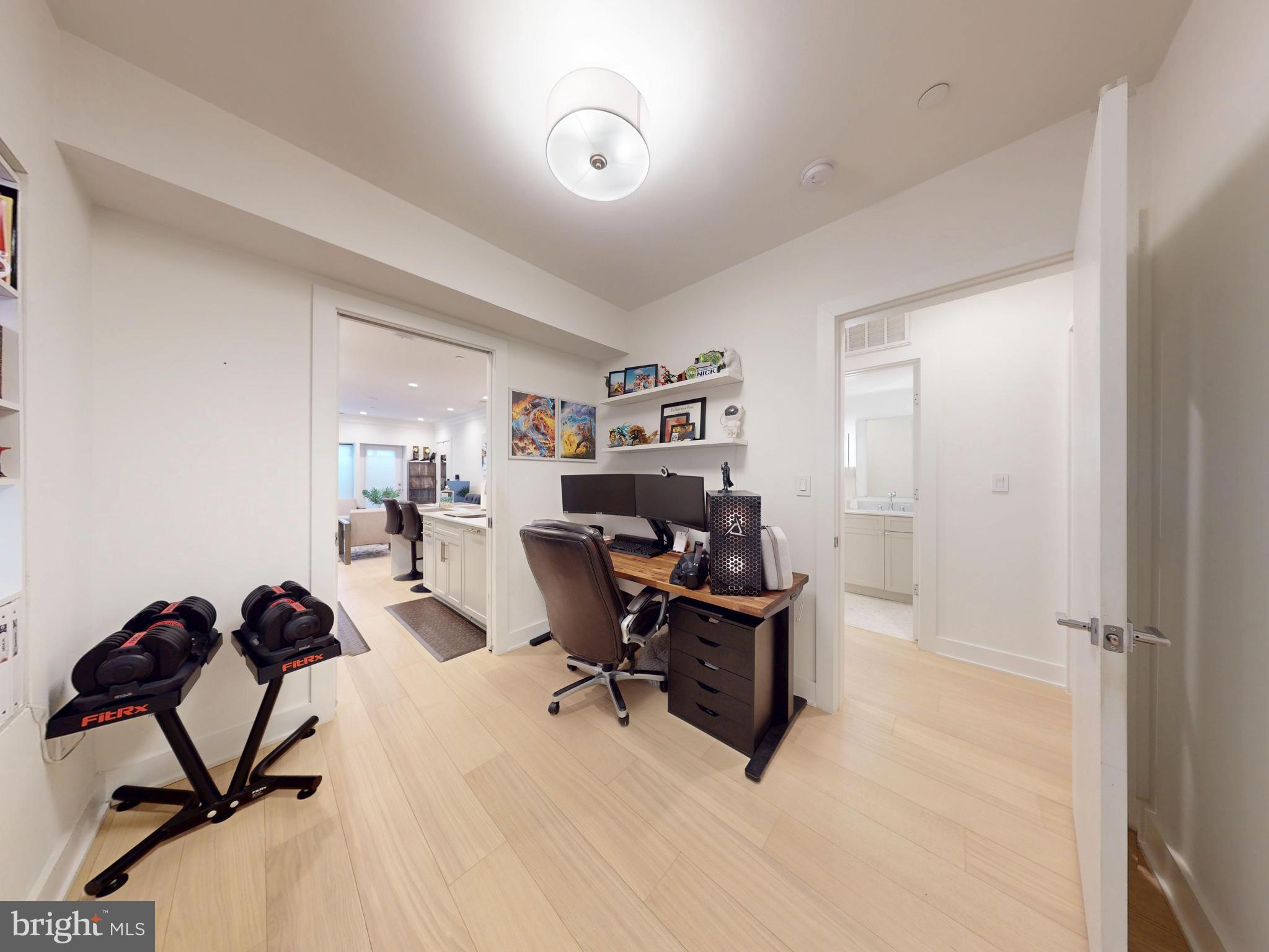 2642 39th Street Northwest, Unit 2 Washington, DC 20007 - Photo 8 of 25 a work room with furniture and a window