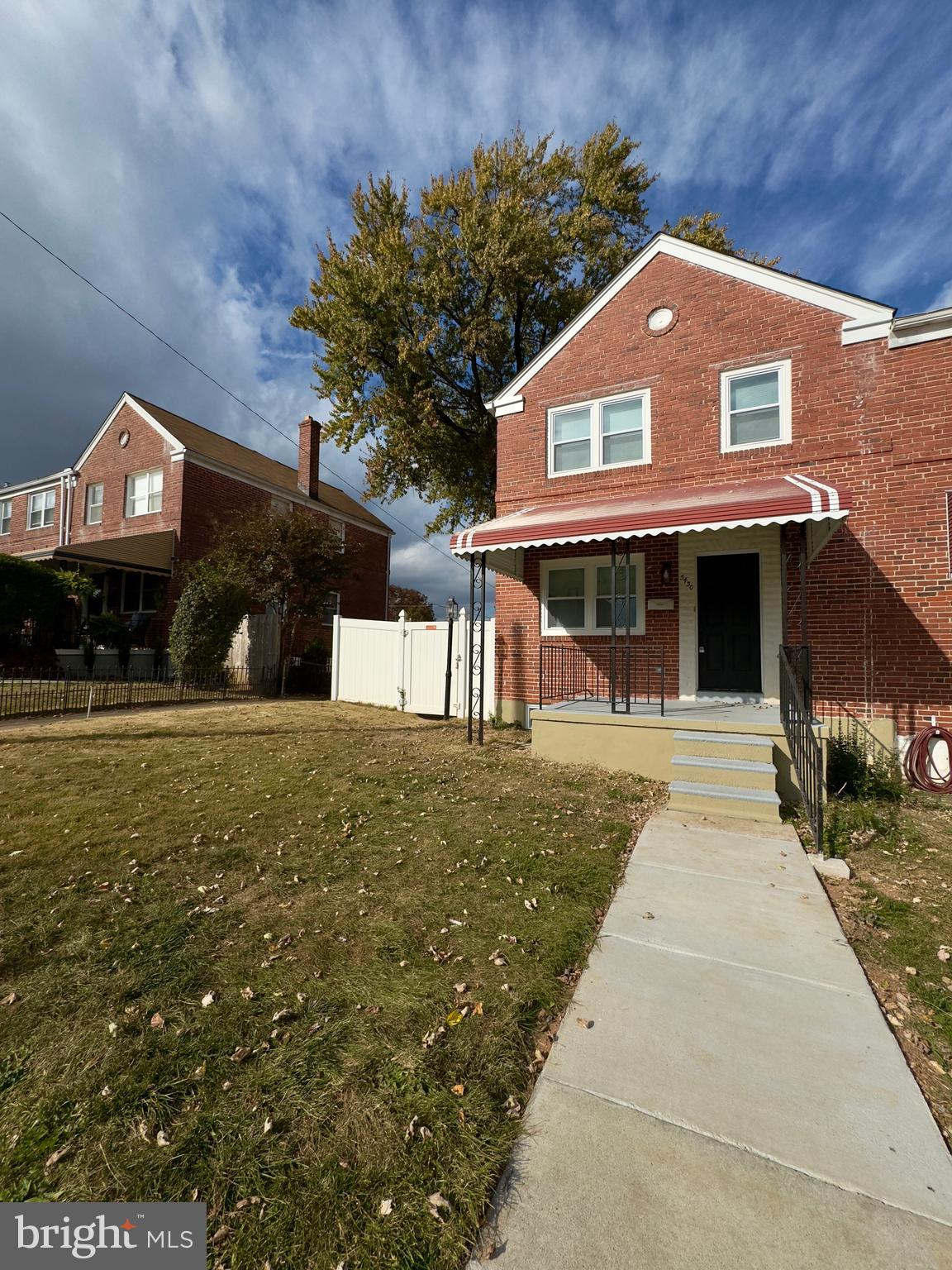 5430 Whitlock Road Baltimore, MD 21229 - Photo 1 of 30 a front view of a house with a yard