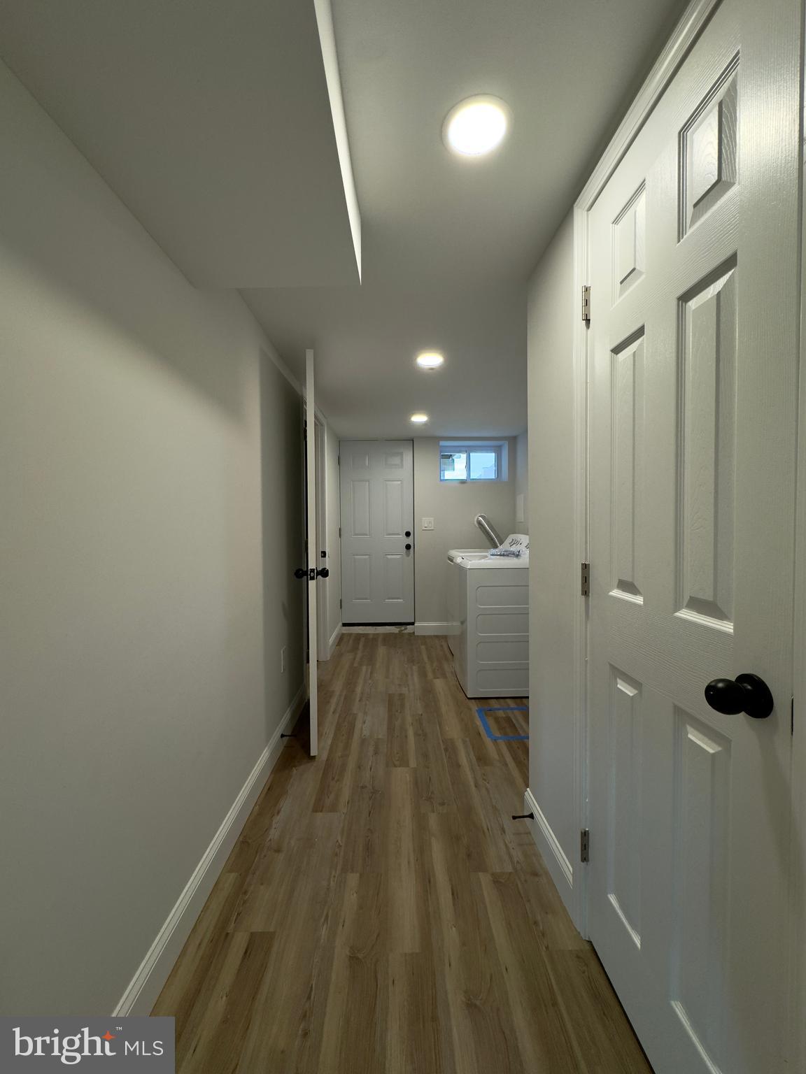 5430 Whitlock Road Baltimore, MD 21229 - Photo 11 of 30 a view of a hallway with wooden floor