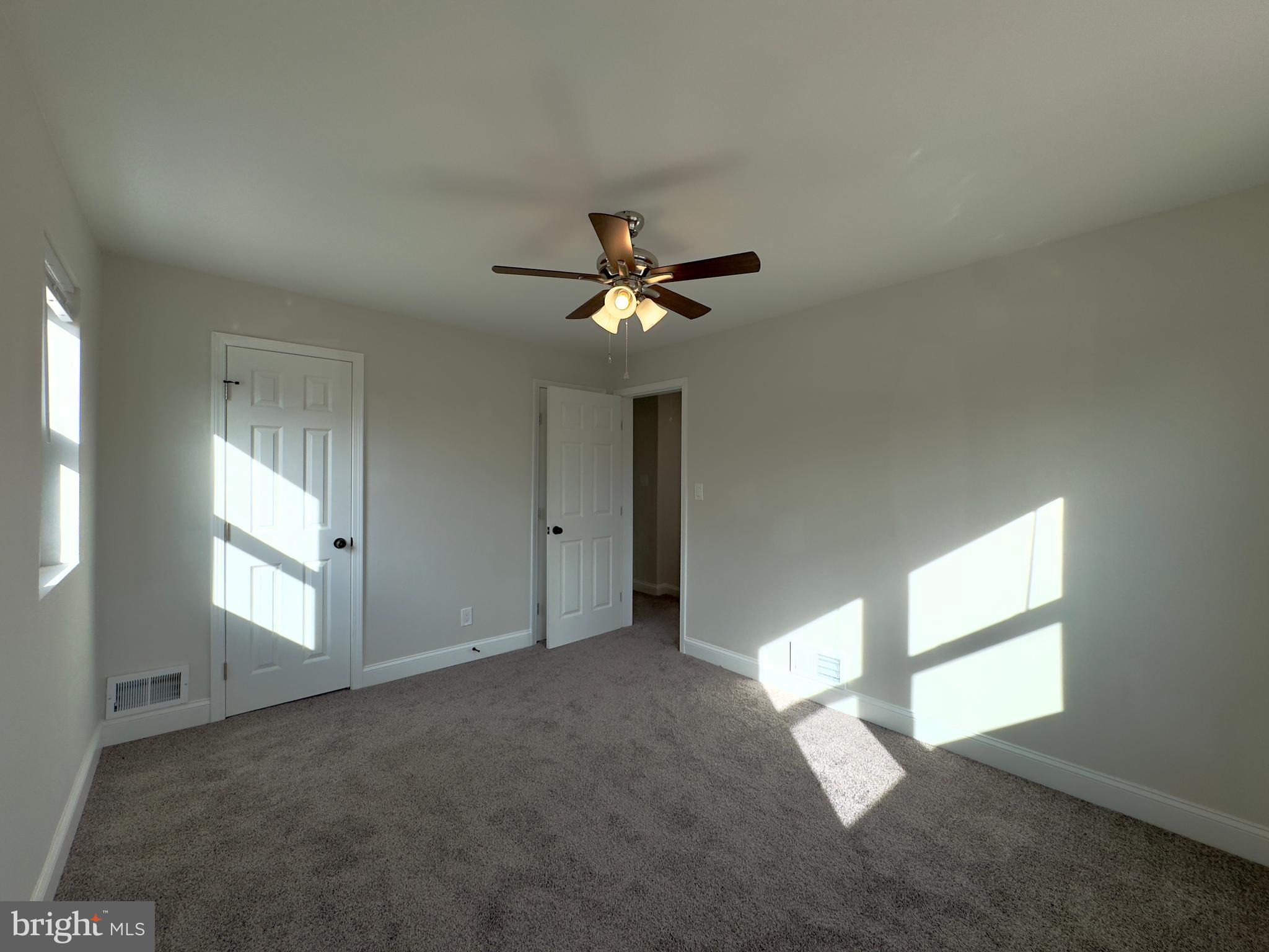5430 Whitlock Road Baltimore, MD 21229 - Photo 20 of 30 a view of an empty room with a window