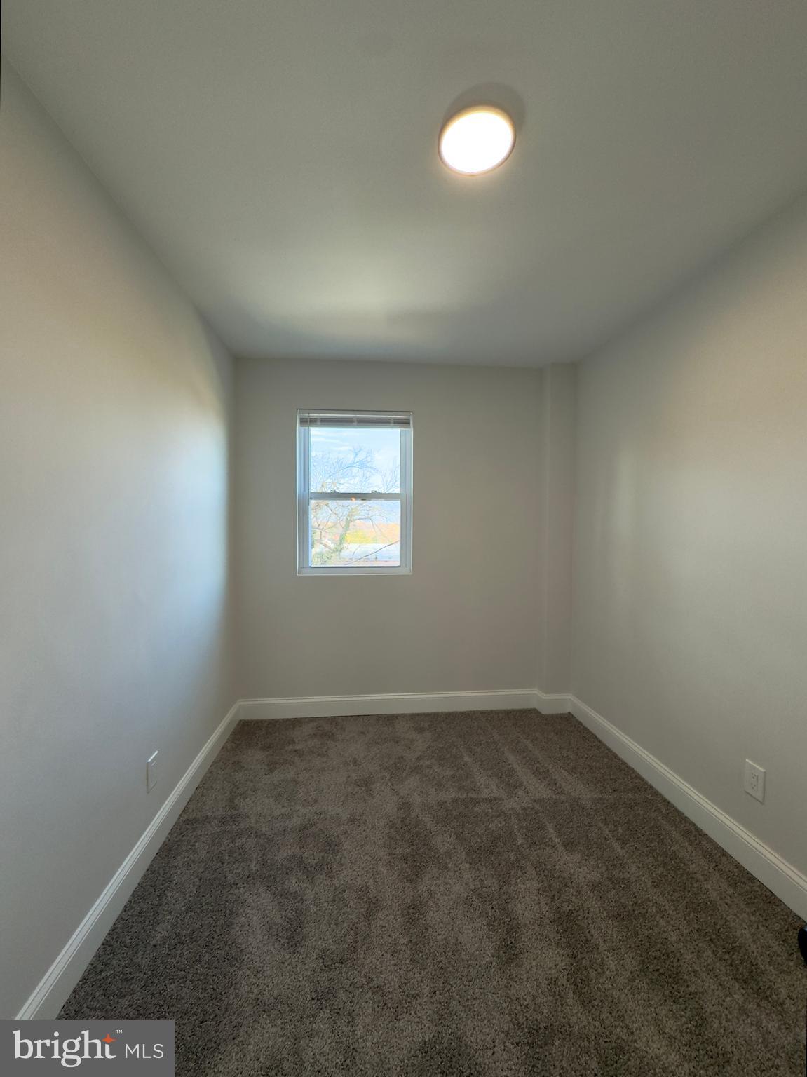 5430 Whitlock Road Baltimore, MD 21229 - Photo 21 of 30 an empty room with a window