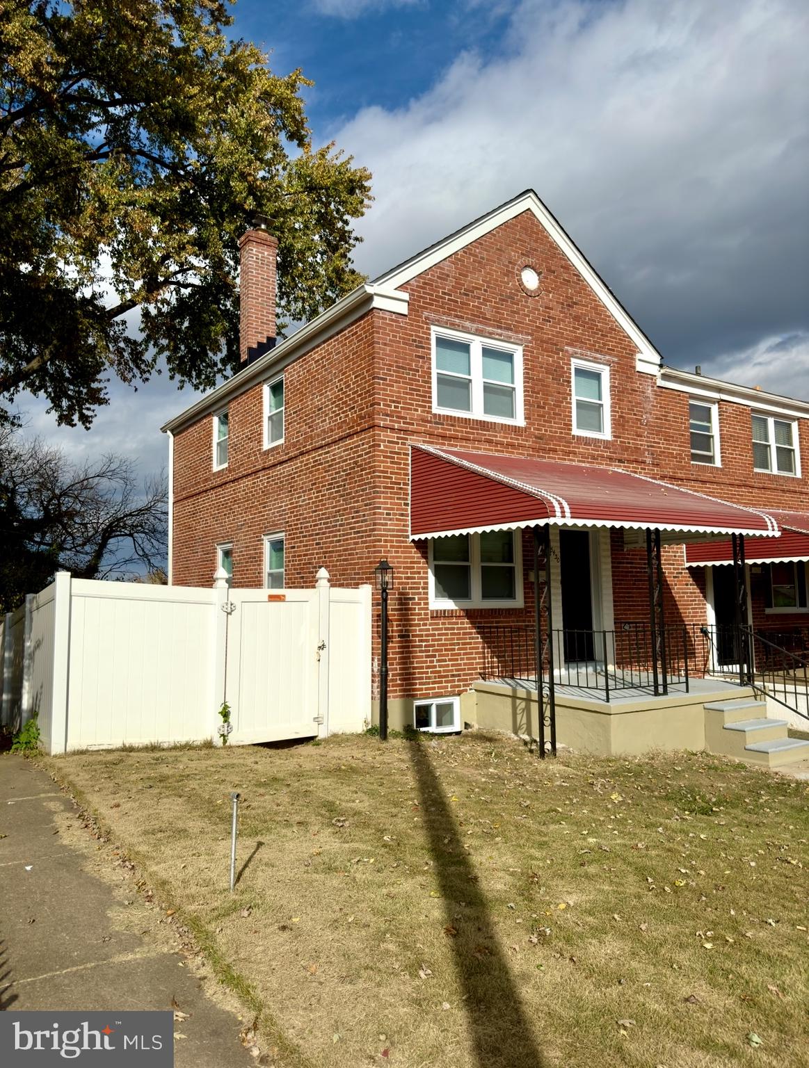 5430 Whitlock Road Baltimore, MD 21229 - Photo 3 of 30 a front view of a house with a yard