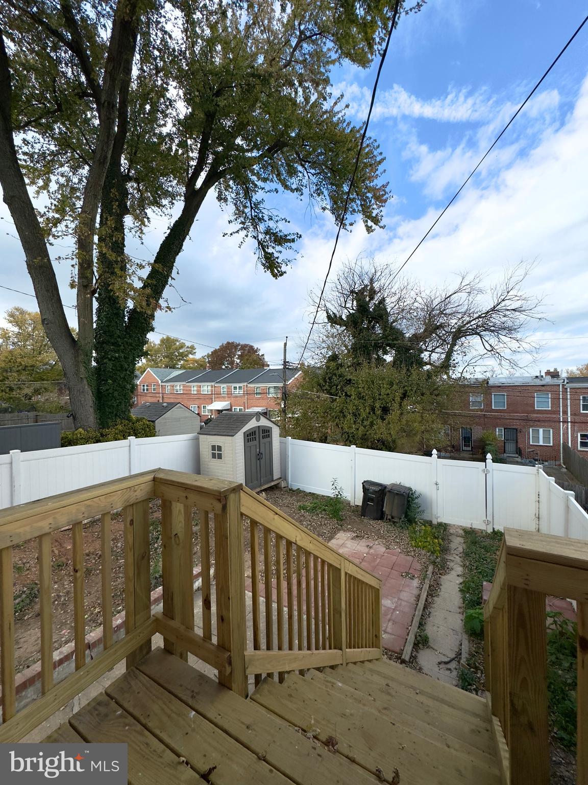 5430 Whitlock Road Baltimore, MD 21229 - Photo 5 of 30 a view of a white house with a yard