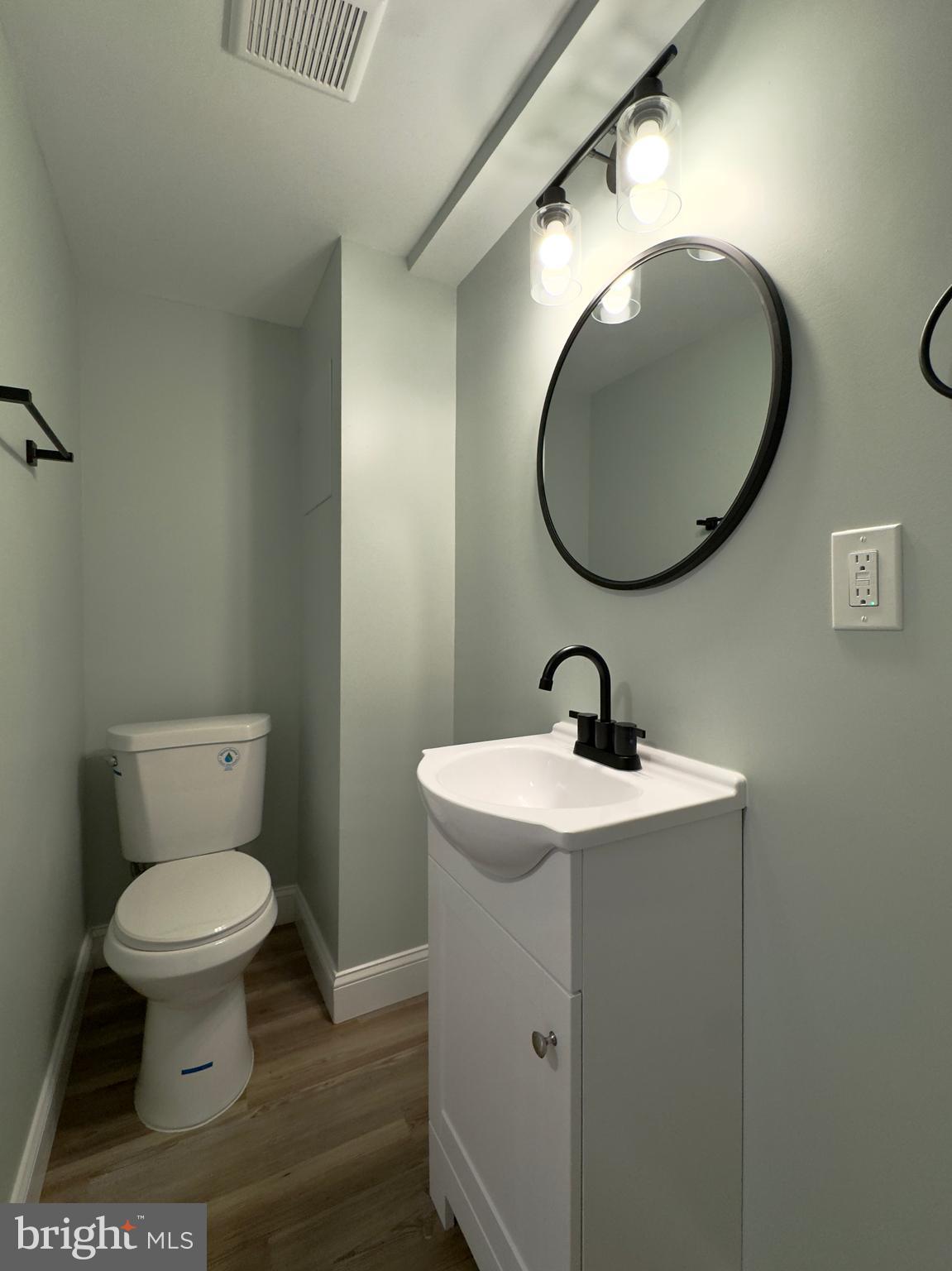 5430 Whitlock Road Baltimore, MD 21229 - Photo 9 of 30 a bathroom with a toilet and a sink