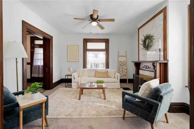 a living room with furniture or couch and a window