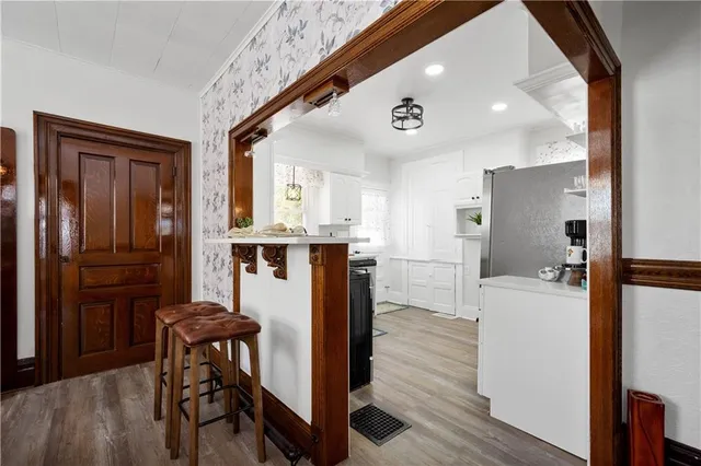 a kitchen with a table and chairs in it