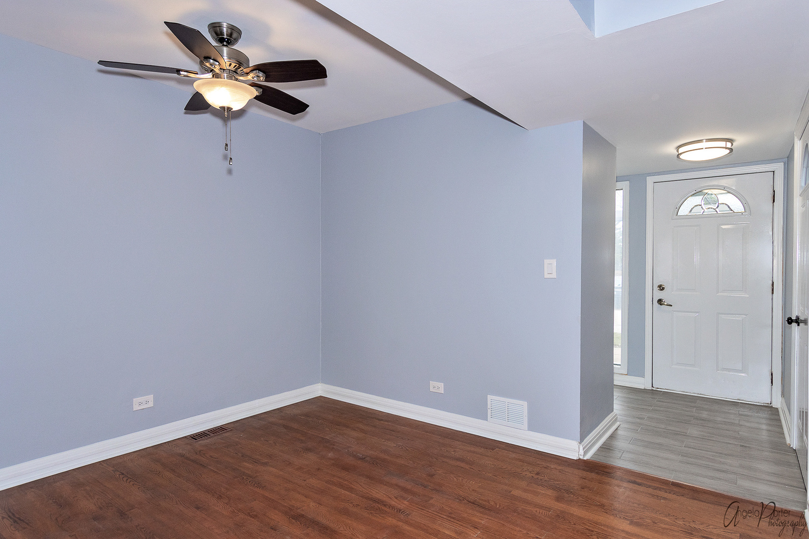 452 Maple Drive Wheeling, IL 60090 - Photo 3 of 30 a view of an empty room with wooden floor