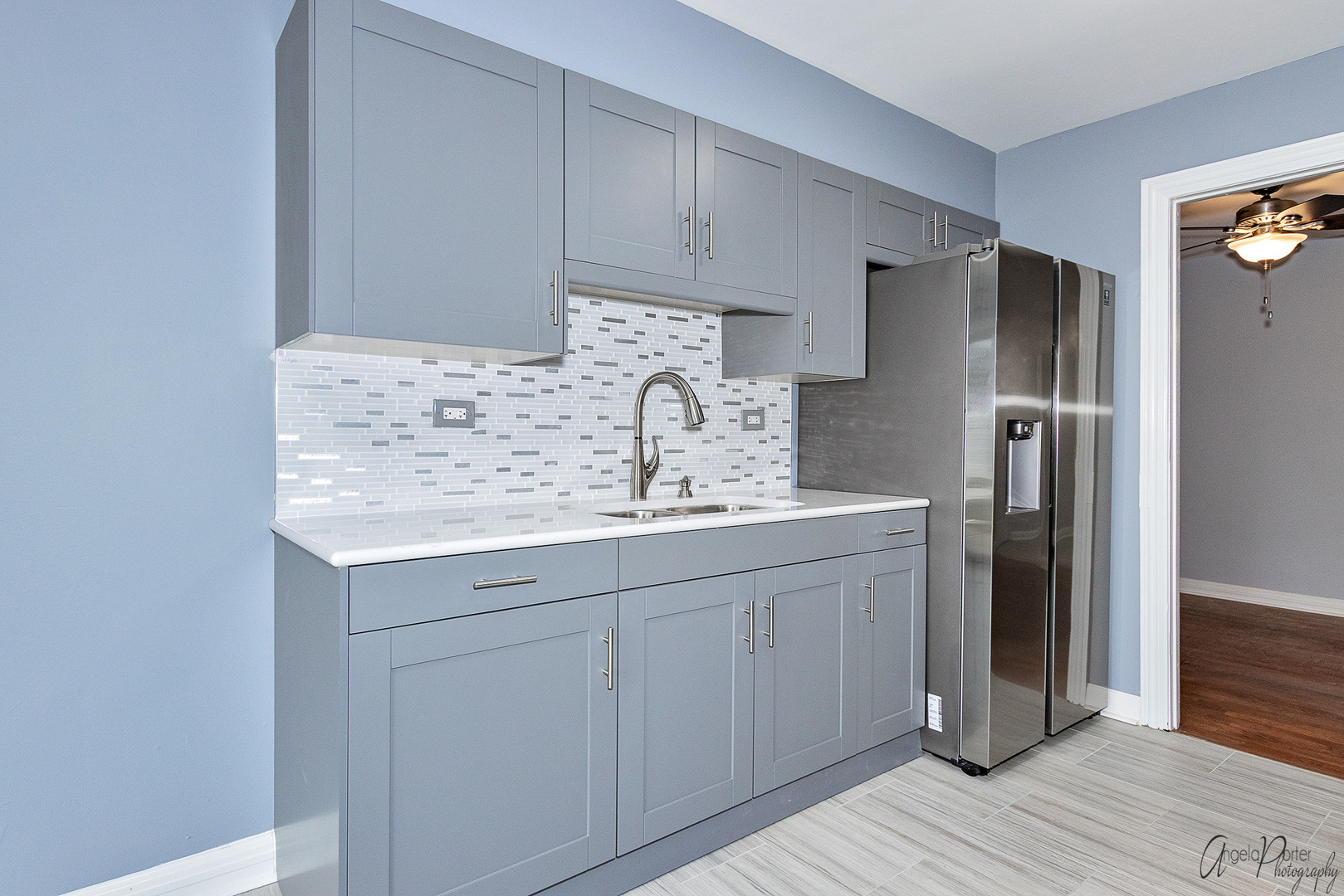 452 Maple Drive Wheeling, IL 60090 - Photo 6 of 30 a kitchen with stainless steel appliances granite countertop a refrigerator and a sink