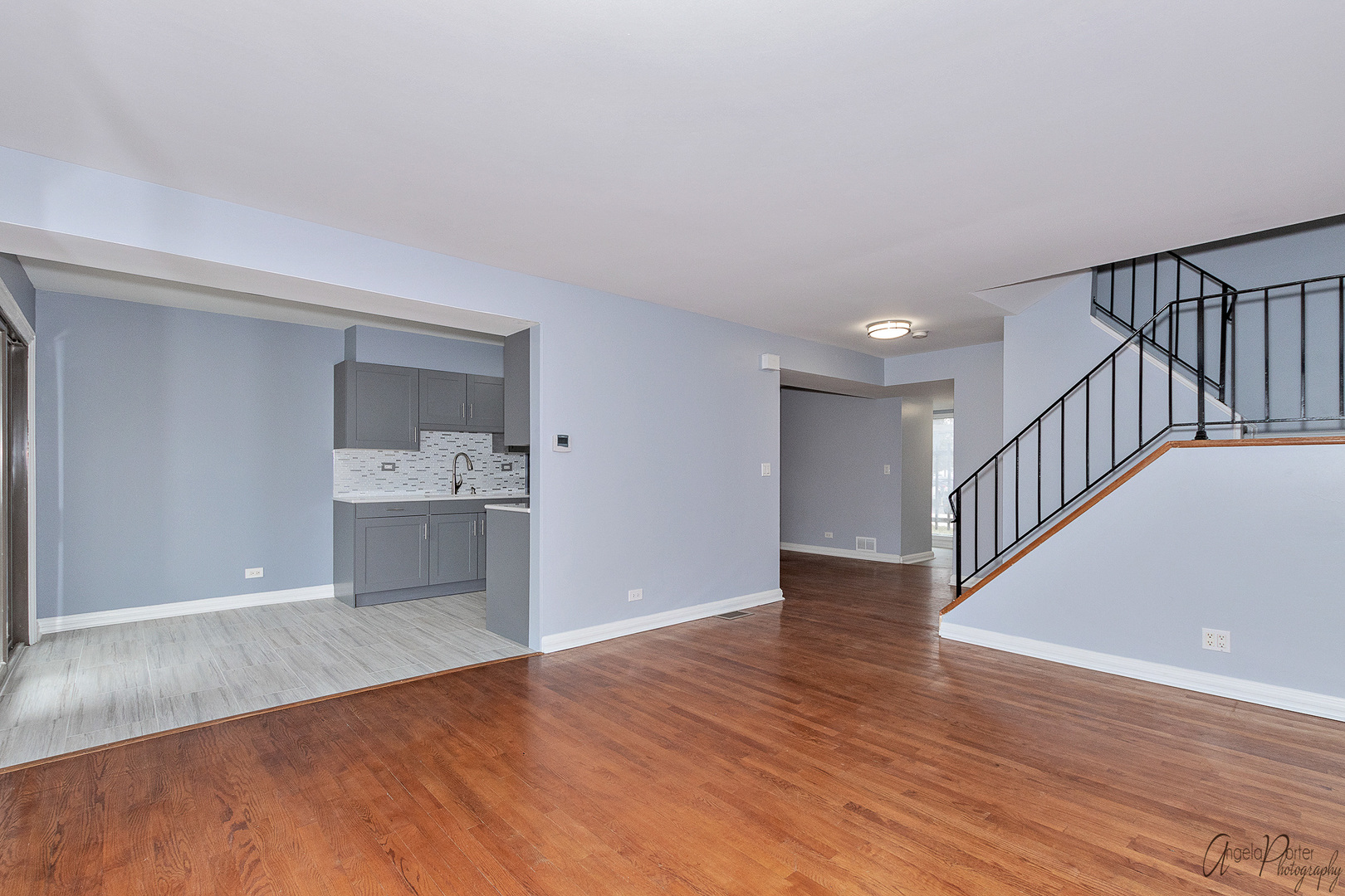 452 Maple Drive Wheeling, IL 60090 - Photo 10 of 30 a view of a kitchen with wooden floor and electronic appliances