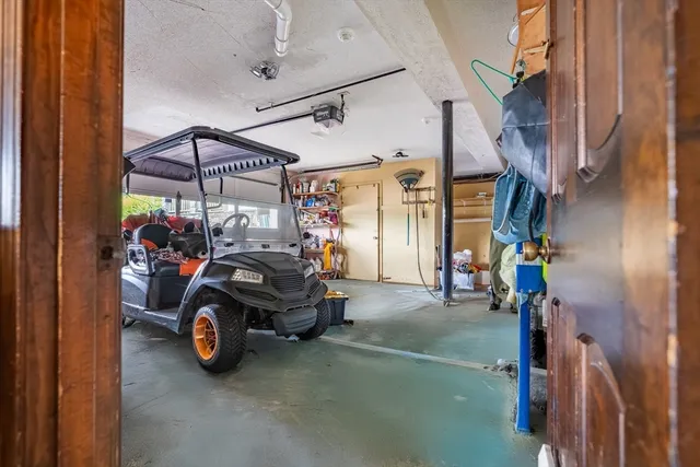 a living room with couch and a rug