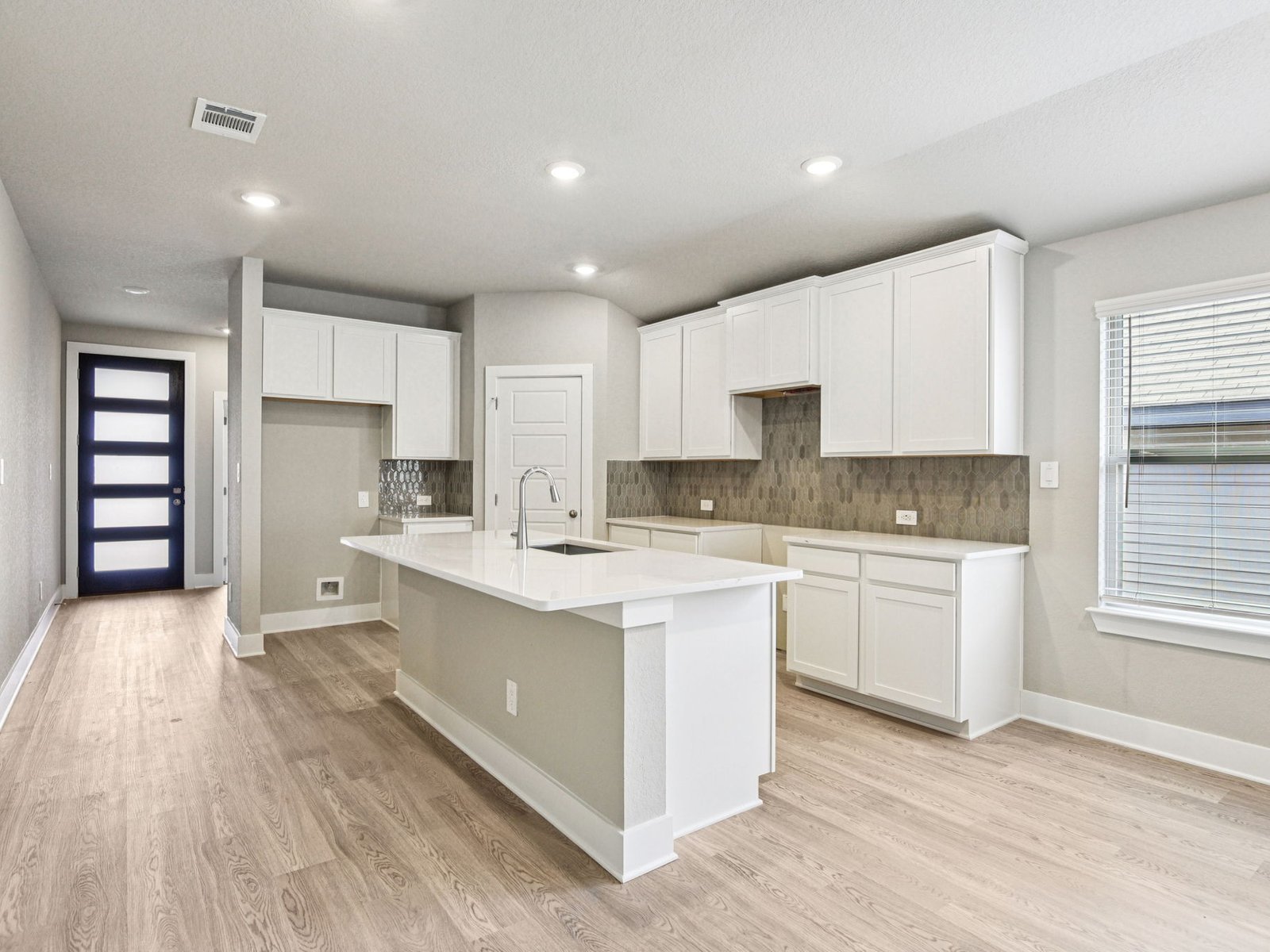 704 Timbo Drive Jarrell, TX 76537 - Photo 3 of 14 Photo is not of the actual home, but is an inspirational photo of builder’s model home and may depict options, furnishings, and/or decorator features that are not included