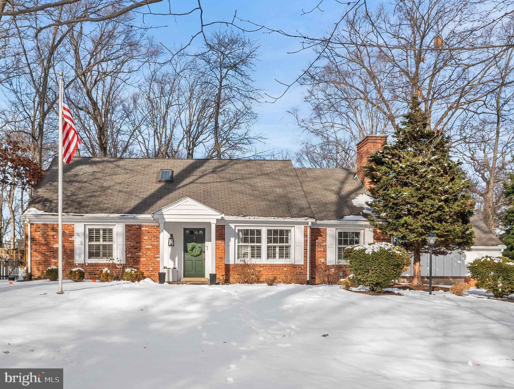 front view of a house with a large windows