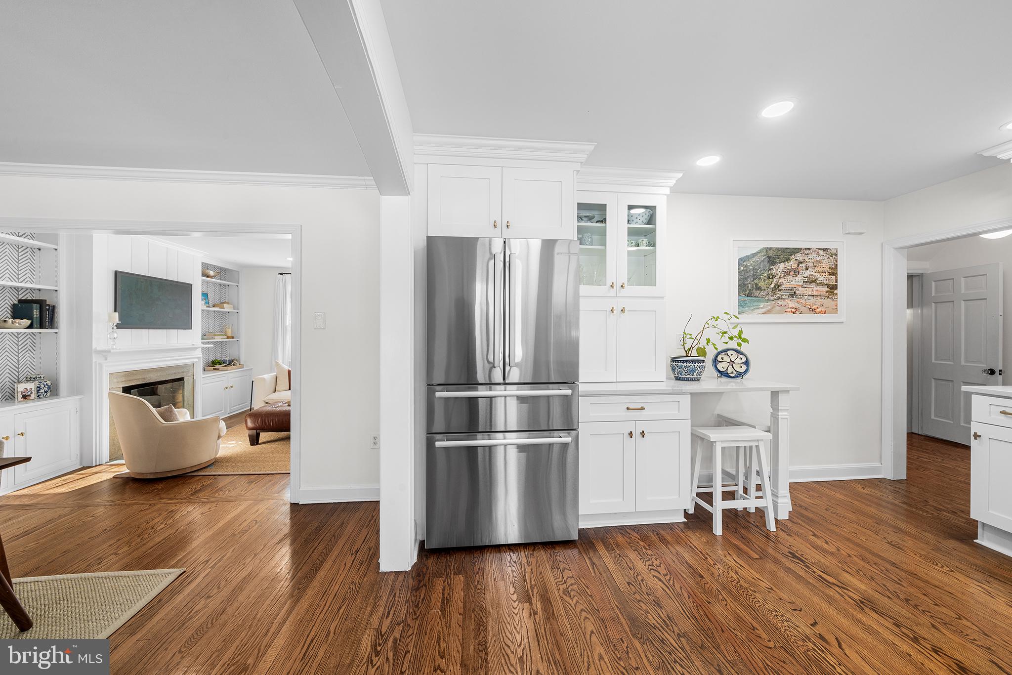 48 Northwoods Road Wayne, PA 19087 - Photo 31 of 31 a kitchen with stainless steel appliances a refrigerator and wooden floor