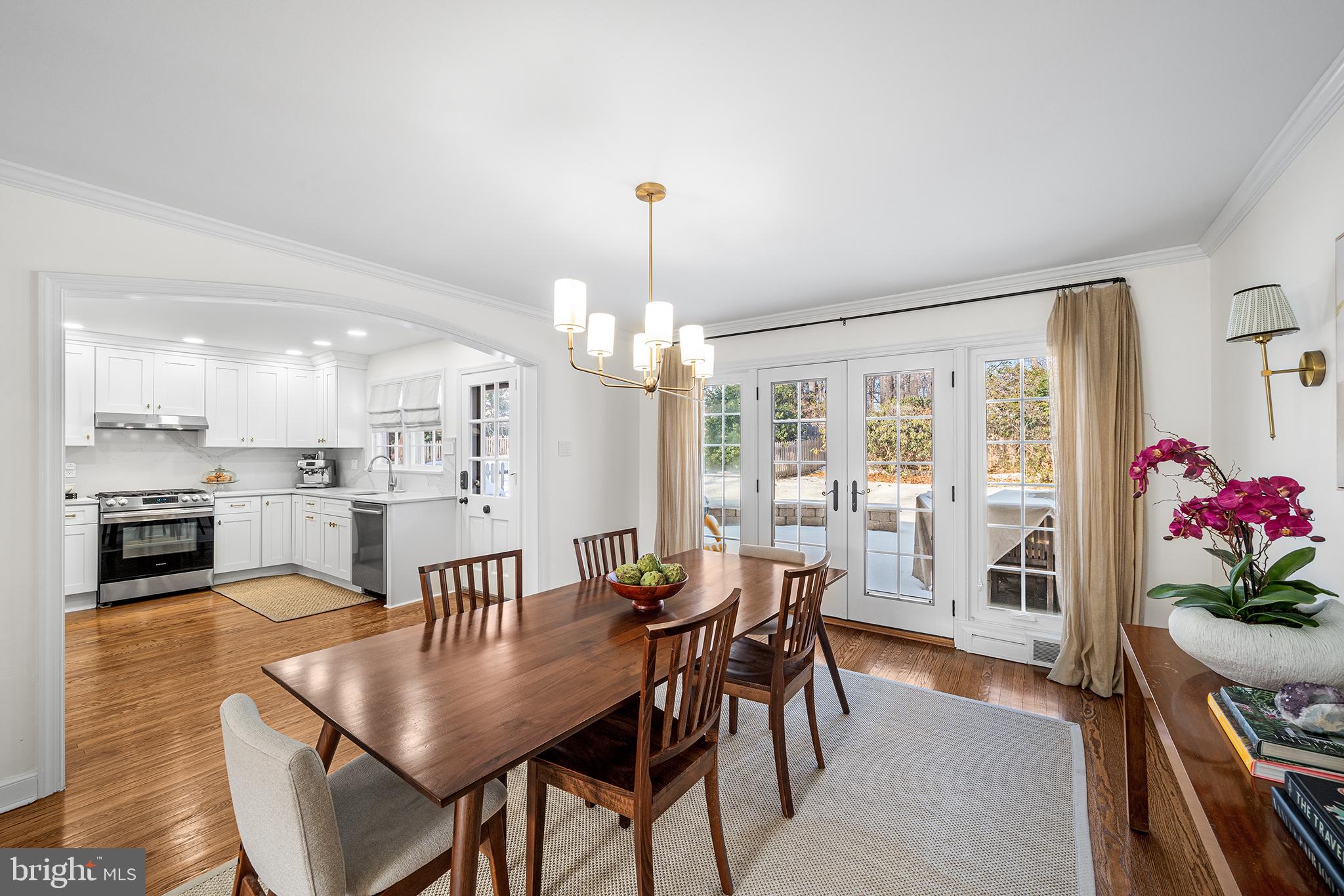 48 Northwoods Road Wayne, PA 19087 - Photo 12 of 31 a view of a dining room with furniture and a chandelier