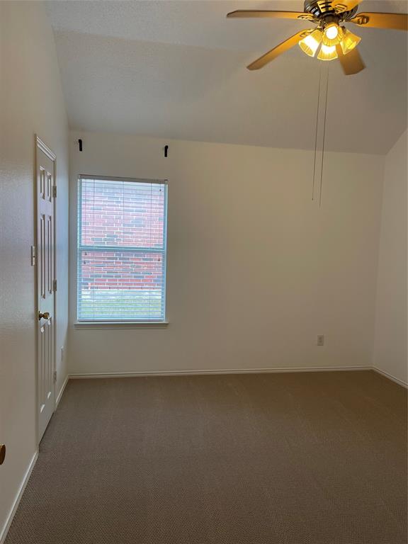 9701 Spring Drive Frisco, TX 75035 - Photo 11 of 18 a view of an empty room with a window