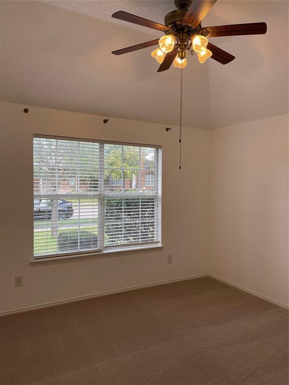 9701 Spring Drive Frisco, TX 75035 - Photo 13 of 18 a view of an empty room with a window