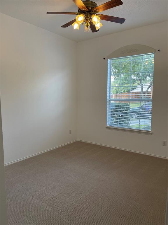 9701 Spring Drive Frisco, TX 75035 - Photo 15 of 18 an empty room with a window