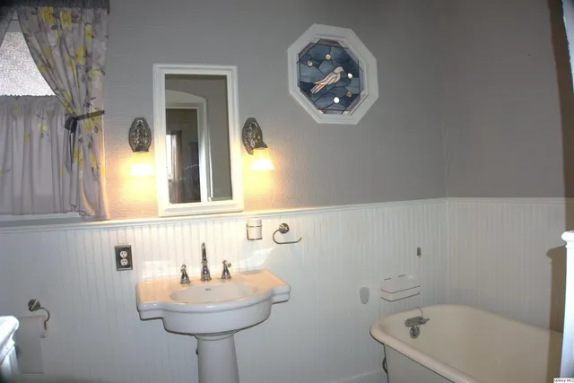 a bathroom with a sink and a bathtub