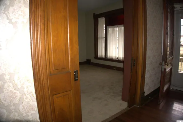 an empty room that has a window