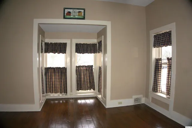 a view of entryway with wooden floor