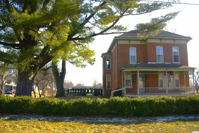 a view of a backyard of the house