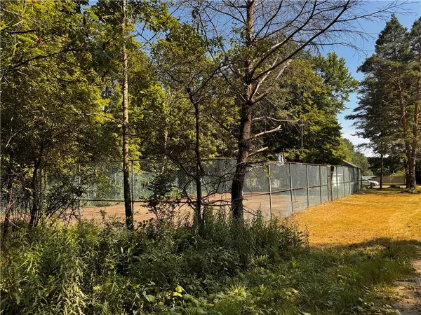 a view of yard with tree and green space