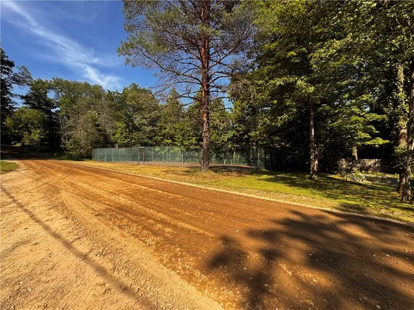 a view of swimming pool with an outdoor space and seating area