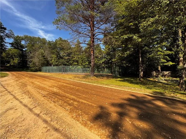 a view of swimming pool with an outdoor space and seating area