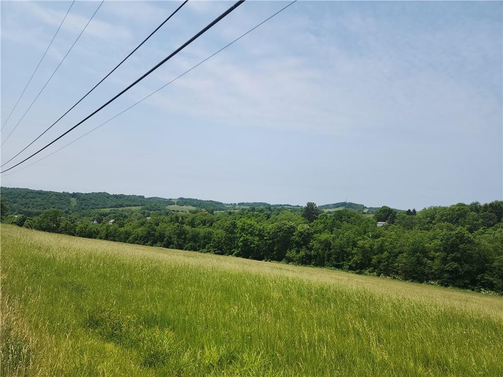 0 Atlas Cherry Valley Road Burgettstown, PA 15021 - Photo 17 of 21 a view of a lush green field