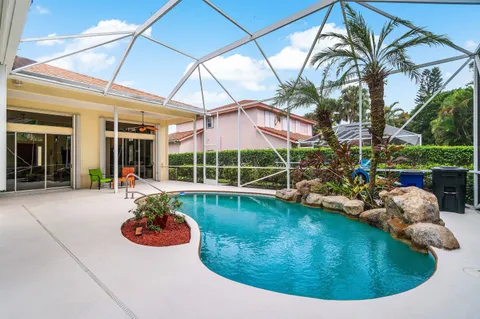 a view of a swimming pool with a patio