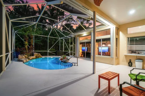 a view of a chairs and tables in the patio