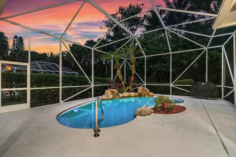 a view of a house with swimming pool