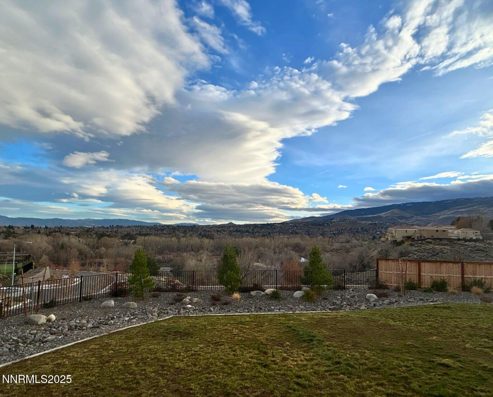 1243 Cedarhaven Court Reno, NV 89523 - Photo 19 of 20 a view of a lake with a yard