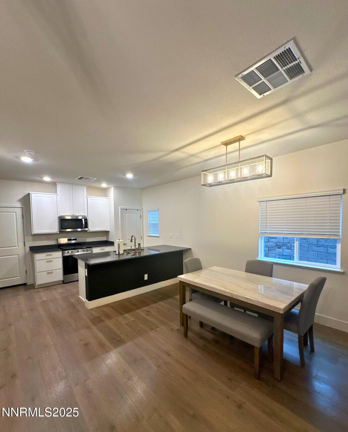 1243 Cedarhaven Court Reno, NV 89523 - Photo 5 of 20 a kitchen with a table and chairs in it