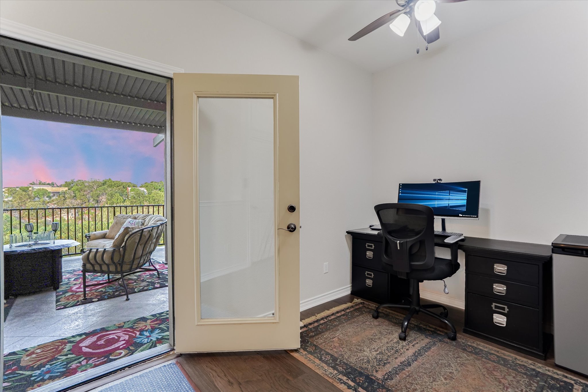 309 Adams Street Georgetown, TX 78628 - Photo 13 of 30 Office area featuring ceiling fan, dark wood-style flooring, and vaulted ceiling