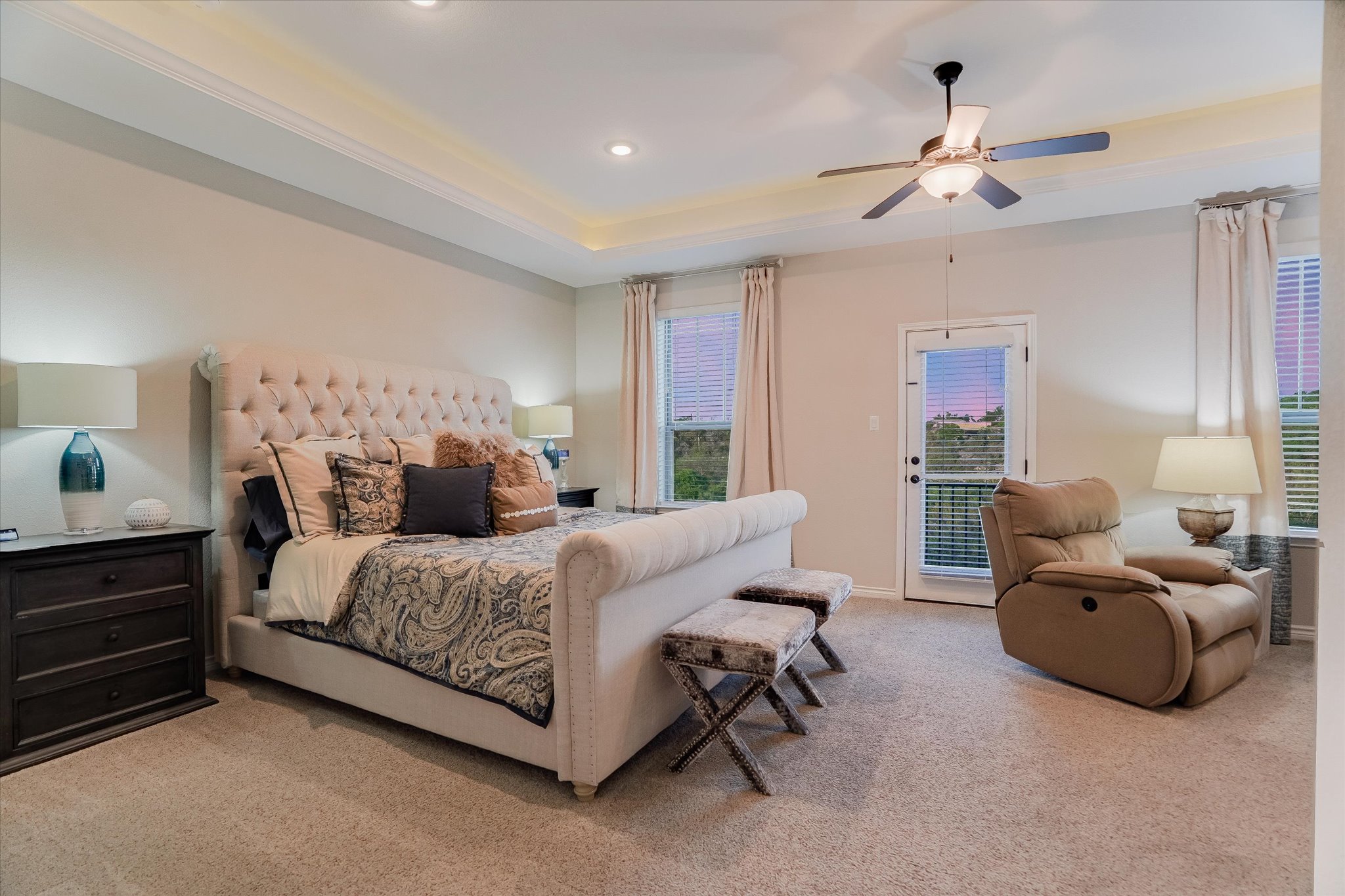 309 Adams Street Georgetown, TX 78628 - Photo 14 of 30 Bedroom featuring light carpet, a raised ceiling, access to exterior, ceiling fan, and recessed lighting