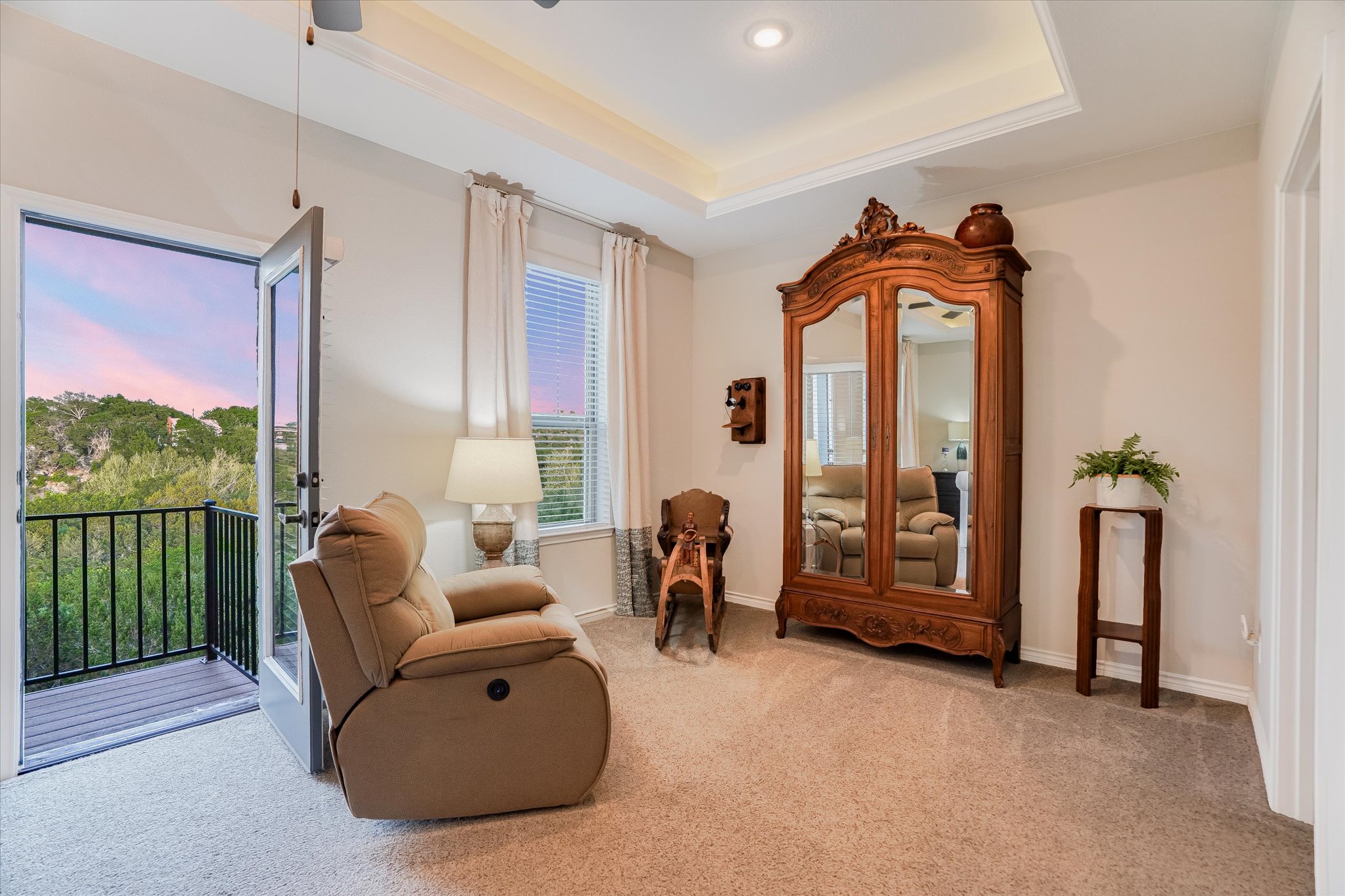 309 Adams Street Georgetown, TX 78628 - Photo 15 of 30 Sitting room with a raised ceiling, light carpet, and a ceiling fan