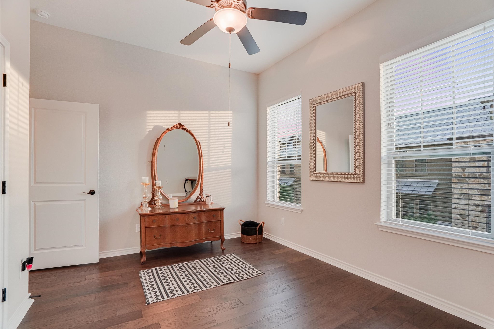 309 Adams Street Georgetown, TX 78628 - Photo 19 of 30 Bedroom featuring dark wood-type flooring and a ceiling fan