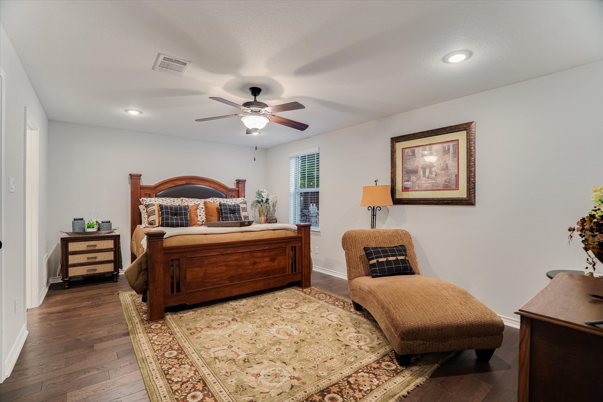 309 Adams Street Georgetown, TX 78628 - Photo 21 of 30 Bedroom with dark wood-type flooring, recessed lighting, and a ceiling fan