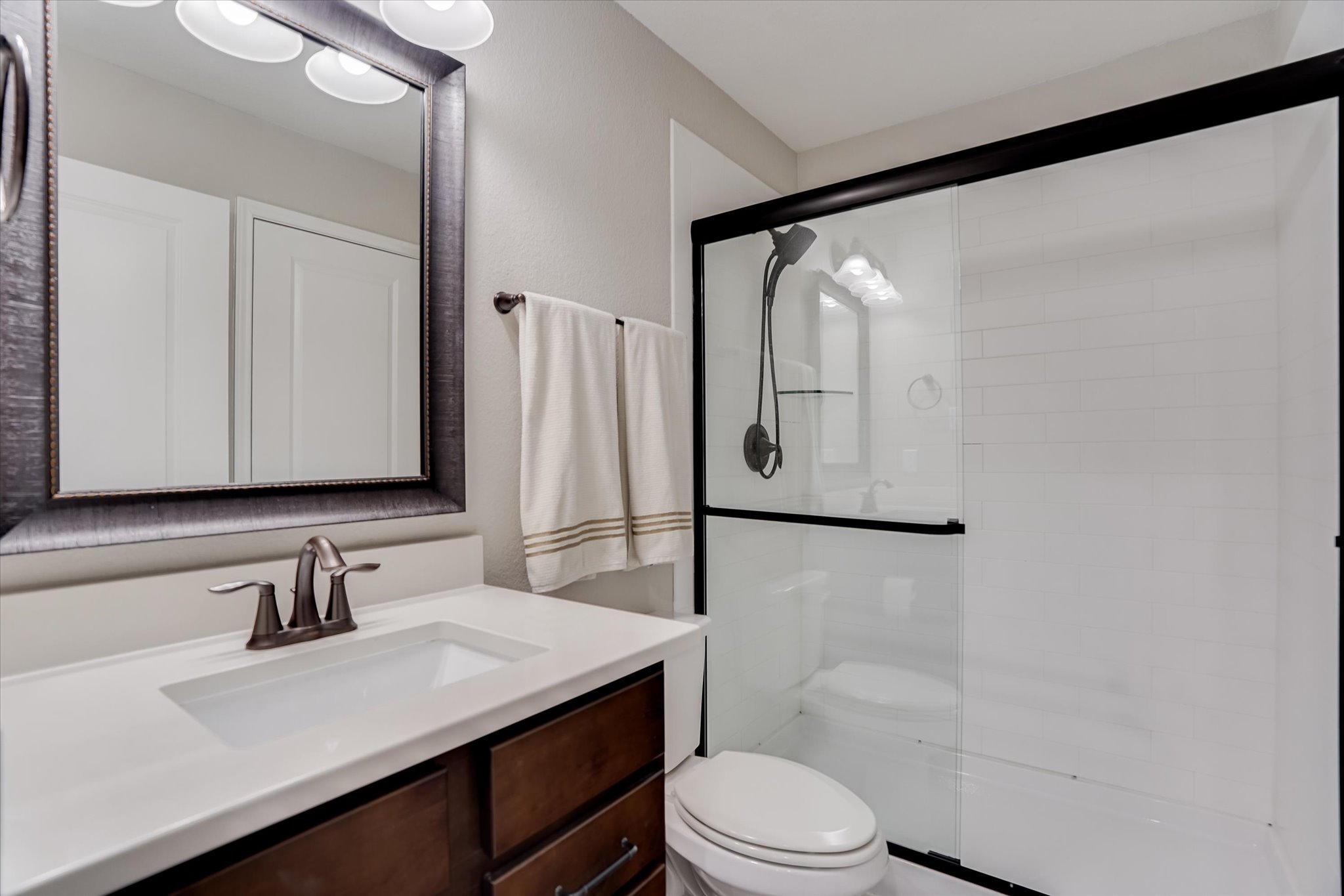 309 Adams Street Georgetown, TX 78628 - Photo 22 of 30 Full bath with vanity and a stall shower