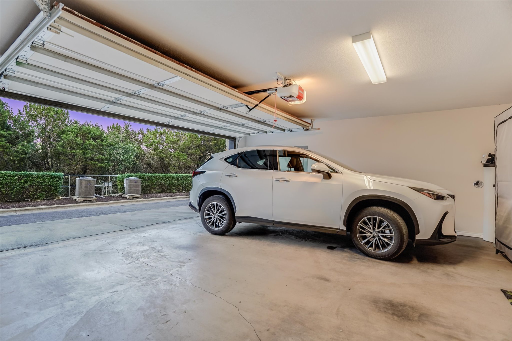 309 Adams Street Georgetown, TX 78628 - Photo 27 of 30 Garage featuring a garage door opener