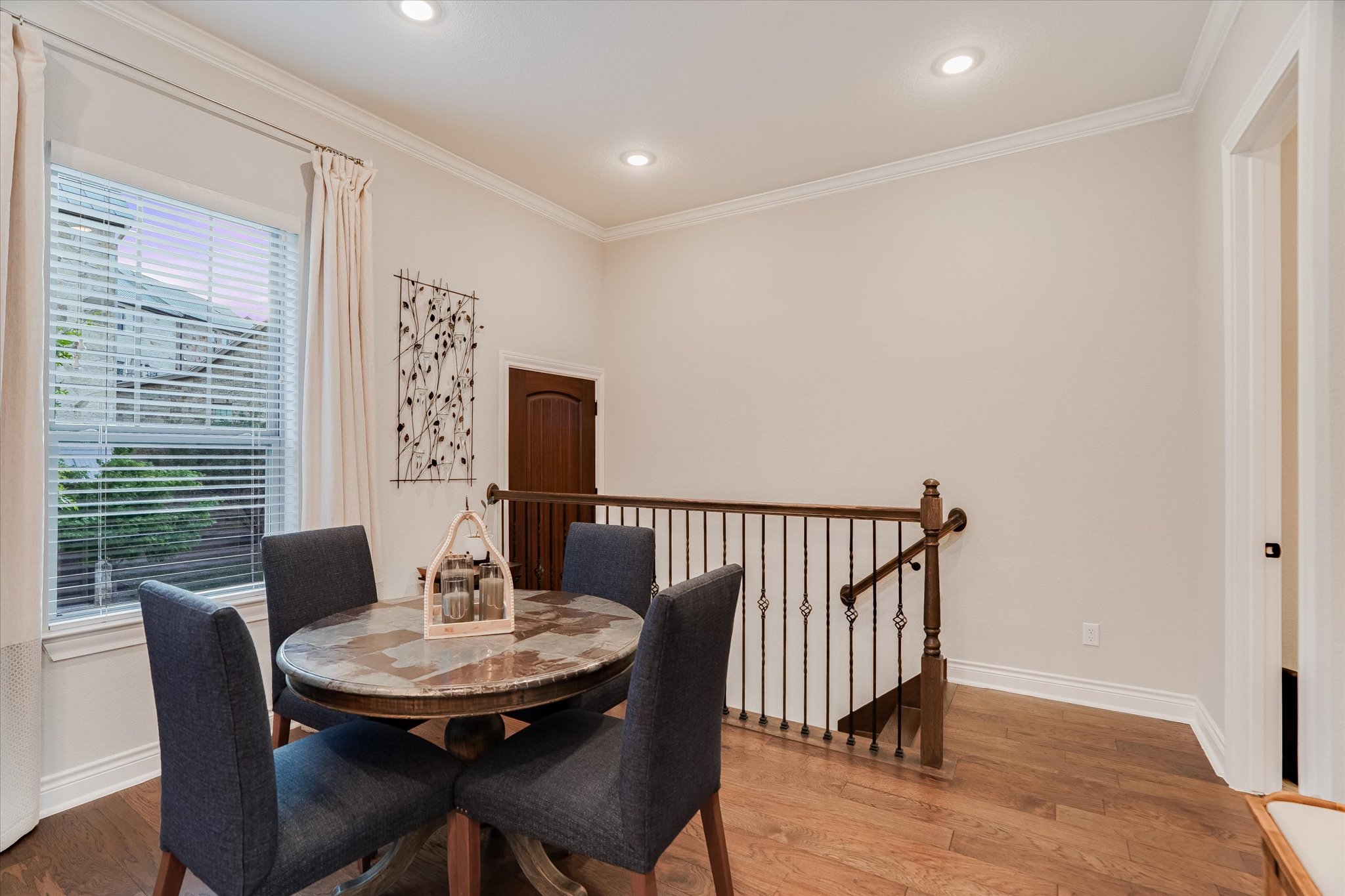 309 Adams Street Georgetown, TX 78628 - Photo 29 of 30 Dining area featuring crown molding, wood finished floors, and recessed lighting